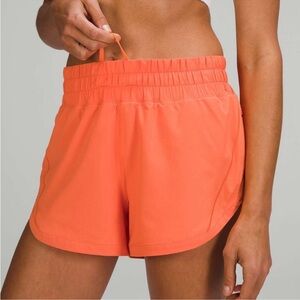 Lululemon track that Orange Shorts 3”